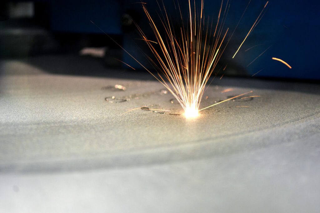 Image shows a high-powered laser for Direct Metal Laser Sintering or DMLS 3D printing