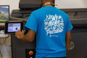 Image of a 3D printing technician in Proto3000 3D Printing Services Facility in Vaughan, Ontario, Canada