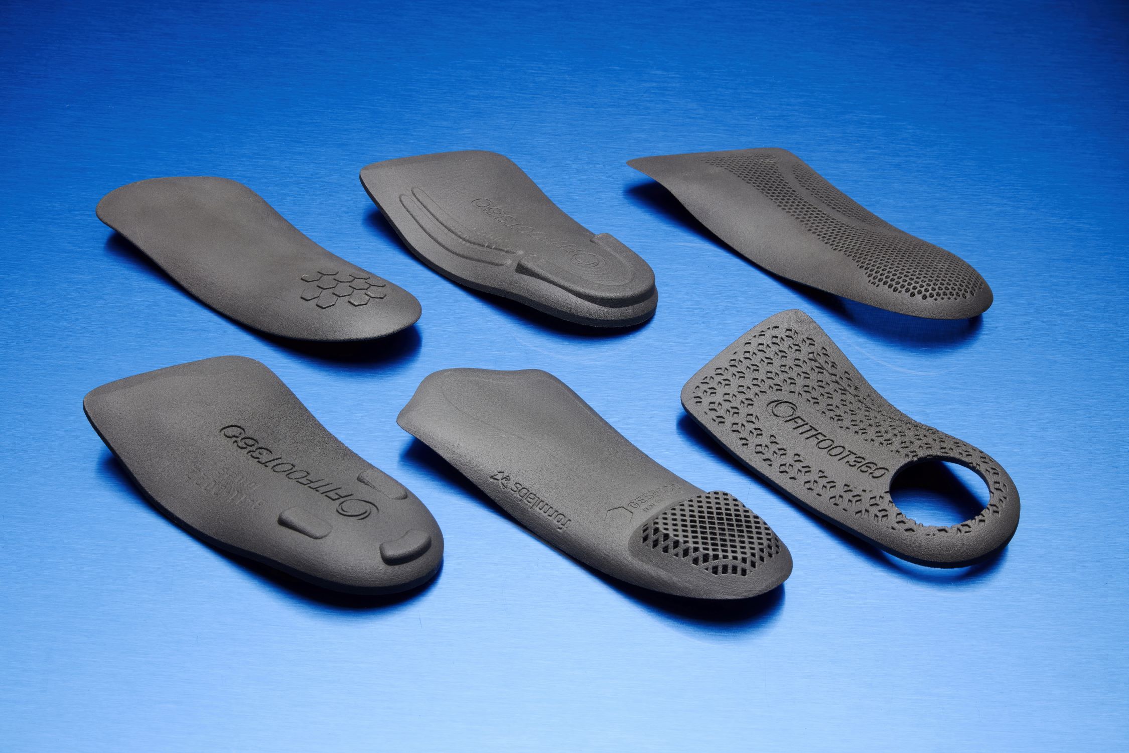 Image of several 3D-printed insoles made with Formlabs Fuse SLA 3D printer