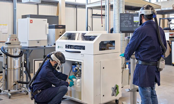 Image shows InnoventX metal 3D-printer at Red Deer Polytechnic being installed
