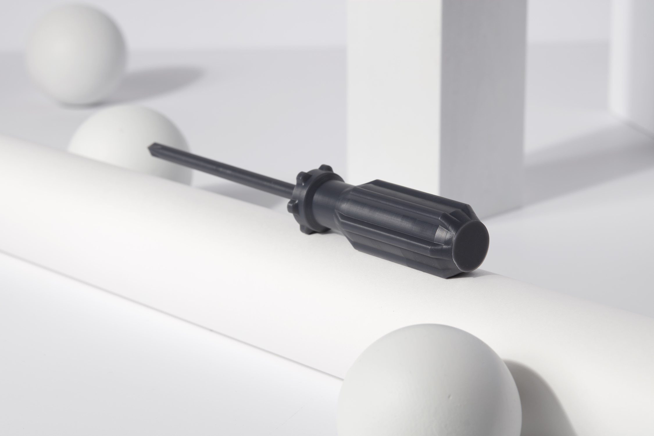 Image shows a screwdriver with 3D printed handle with Formlabs Tough 2000 SLA resin